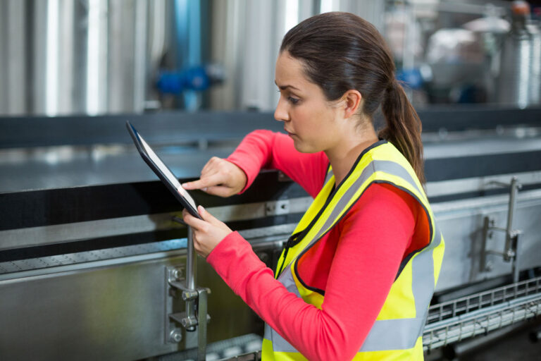 female-factory-worker-using-digital-tablet-2026-03-25-01-12-19-utc